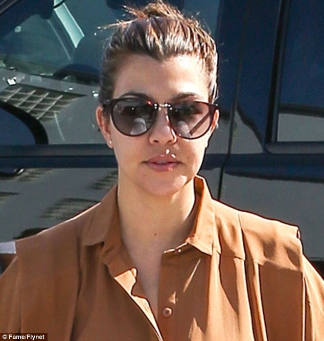 Kourtney Kardashian diamond shape sunglasses